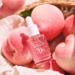 Frasco do Peach 70 Sérum de Niacinamida 30ml da Anua, tratamento facial iluminador com extrato de pêssego e niacinamida.