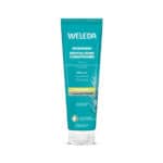 Condicionador revitalizante de alecrim Weleda em embalagem de 150ml, fórmula natural que fortalece e dá brilho ao cabelo.
